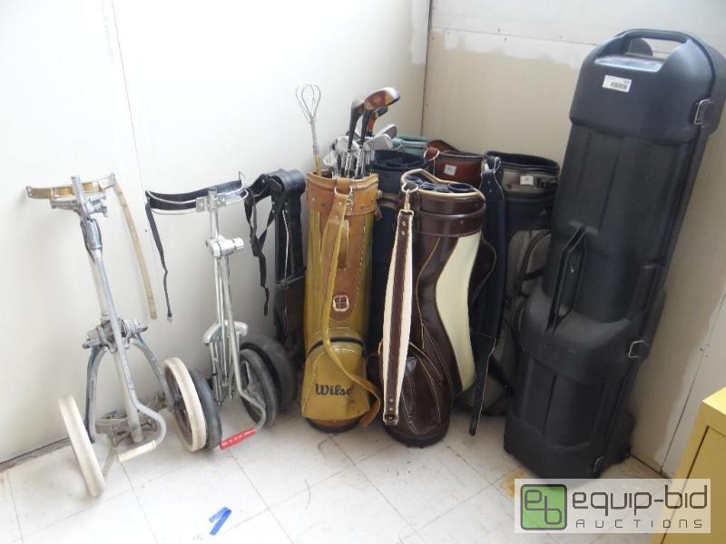 lot 1615 image: 7 golf bags, some golf clubs and 3 bag carts....