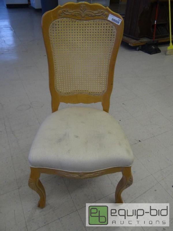 lot 1618 image: Padded wood frame chair....