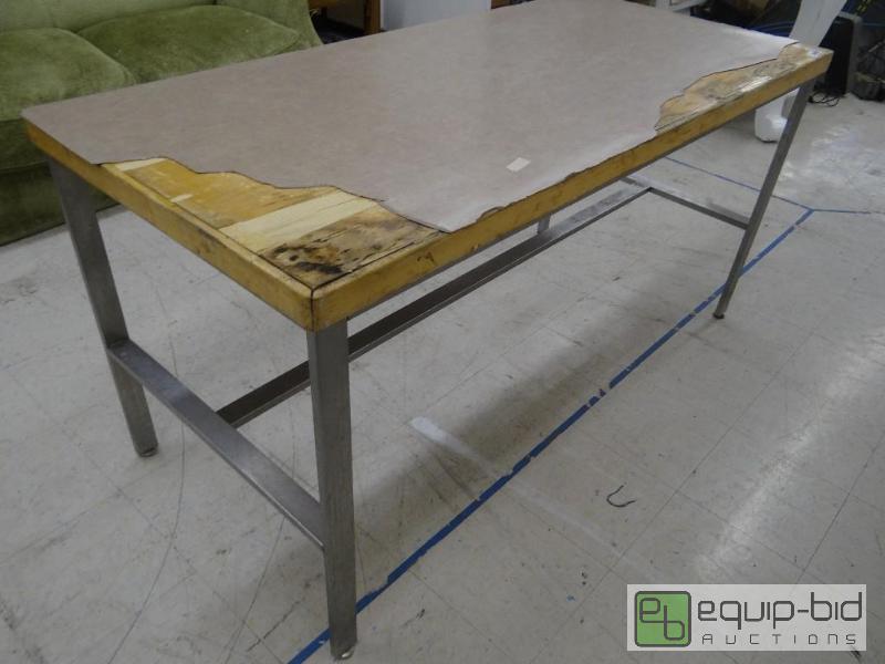 lot 1629 image: Table with ss legs....