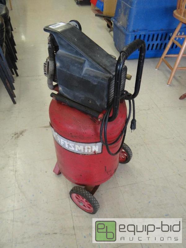 lot 1682 image: Craftsman air compressor on wheels.  Works as...