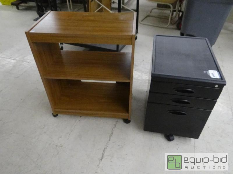 lot 1712 image: Microwave cart on wheels and black 3 drawer c...