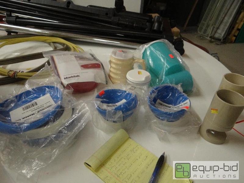 lot 1725 image: Lot of new medical scooper bowls, cups, misc....