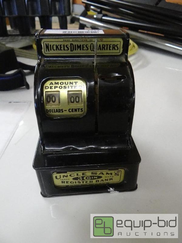 lot 1734 image: Vintage metal cash register bank....
