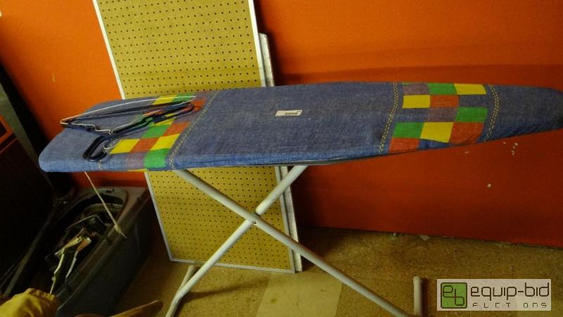 lot 533 image: Ironing board and 3 hangers....