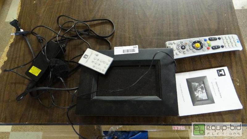 lot 543 image: Digital 7&quot photo frame with remote....