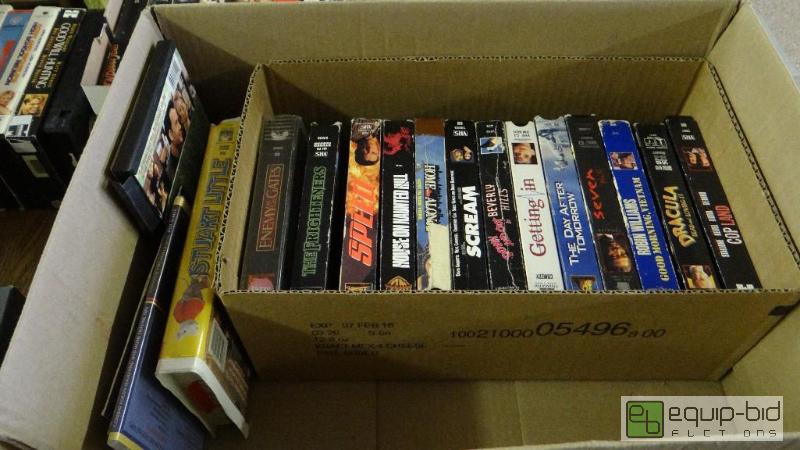 lot 544 image: VHS player and assorted VHS movies....