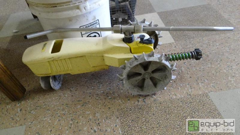 lot 554 image: Small animal trap and tractor lawn sprinkler....