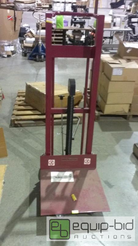 lot 1588 image: Four wheeled platform lift truck Like New Con...