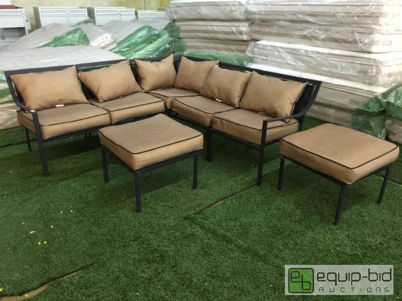 lot 5057 image: LIVING CASUAL BRAND 7 PIECE PATIO INCLUDING SECTIONAL AND TWO FOOT STOOLS.