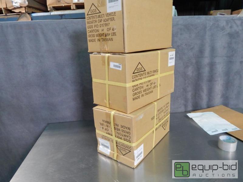 lot 2496 image: 3 Cases of Radiator Cap Adapters