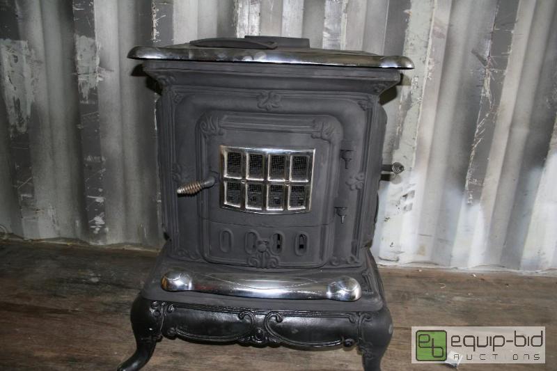 lot 2001 image: Wood stove. 32&quot tall, 27&quot long, 22&...
