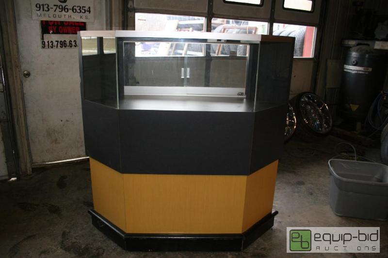 lot 2003 image: Glass front display case. 58&quot tall, 57&q...