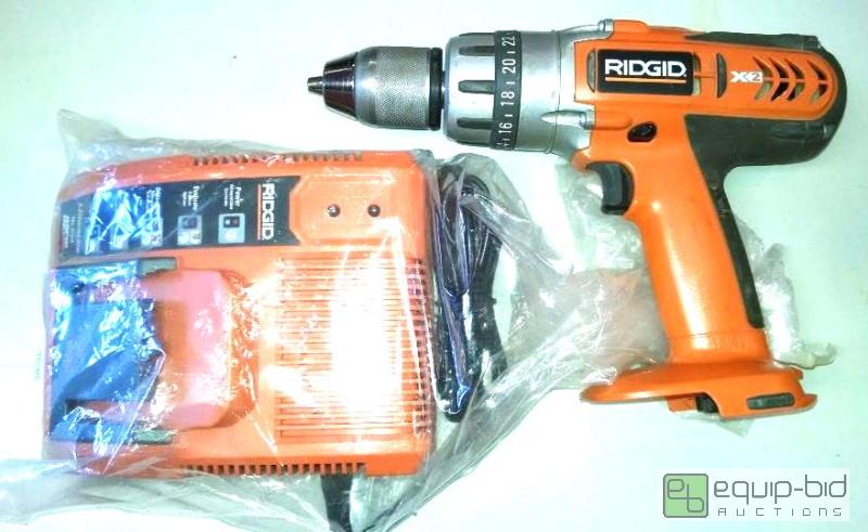 lot 4043 image: Ridgid14.4 volt drill model R83015 drill and ...