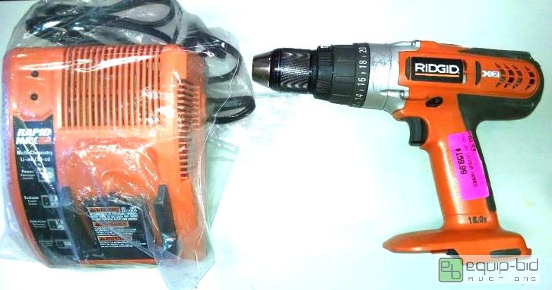 lot 4044 image: Ridgid 18 volt cordles drill and charger,batt...