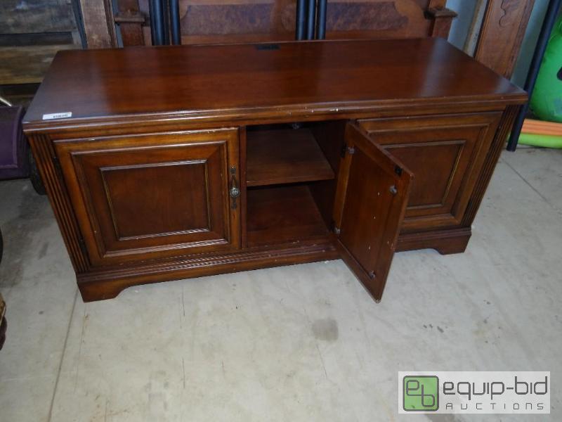 lot 602 image: Wood TV stand with under storage....