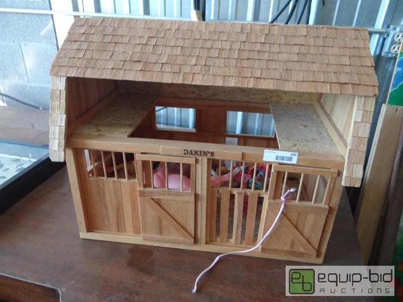 lot 645 image: Wood horse barn with toy horses.  25&quot lo...