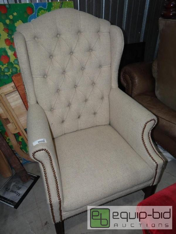 lot 654 image: Wing back chair with nail head trim....