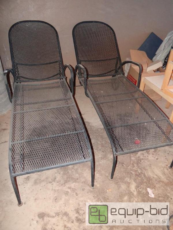 lot 667 image: Set of 2 wrought iron patio chase lounges....