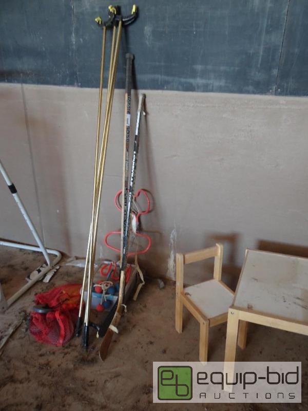 lot 668 image: Shuffleboard poles, discs, hockey sticks, kid...