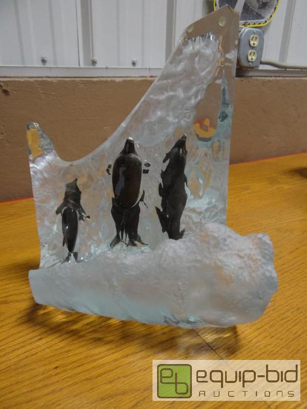 lot 683 image: Decorative counter top dolphins riding the wa...