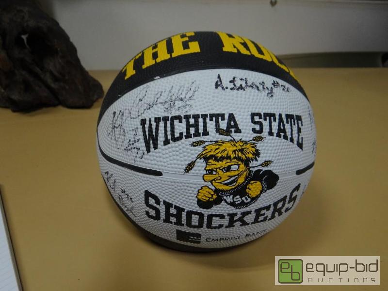 lot 693 image: WSU Shockers basketball signed by players....