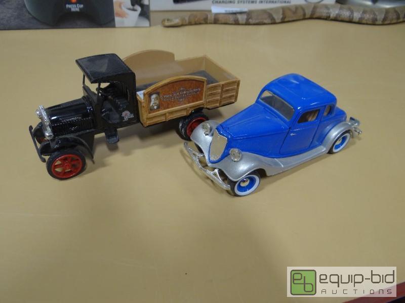 lot 723 image: 2 die cast cars. 8&quot long....