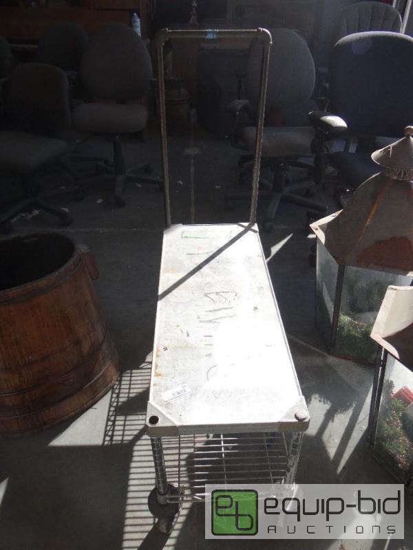 lot 743 image: Metro warehouse cart on wheels....