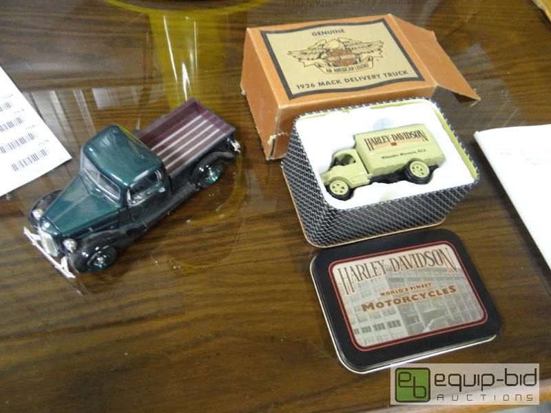 lot 748 image: Die cast truck and genuine Harley Davidson di...