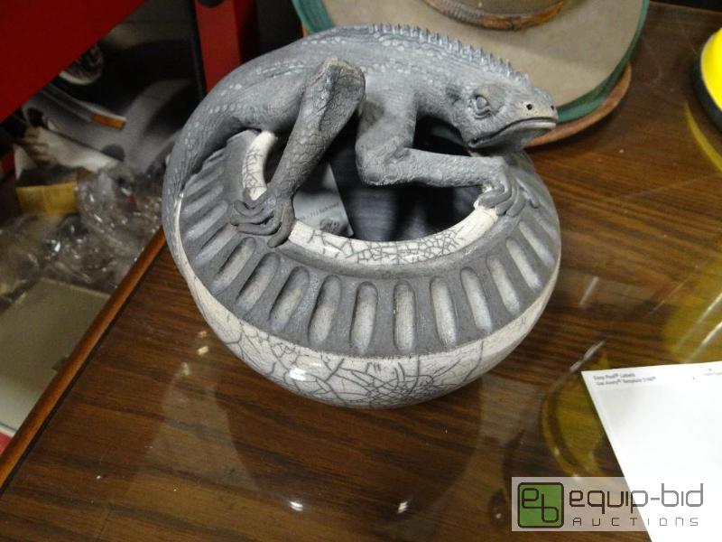 lot 750 image: Hand made pottery with Iguana.  Signed by art...