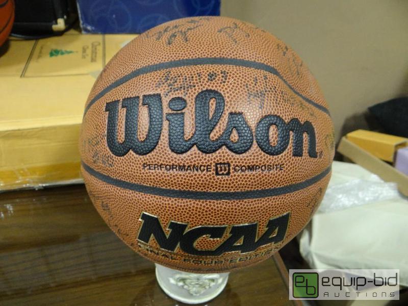 lot 755 image: 2005-2006 team signed full size Wilson basket...
