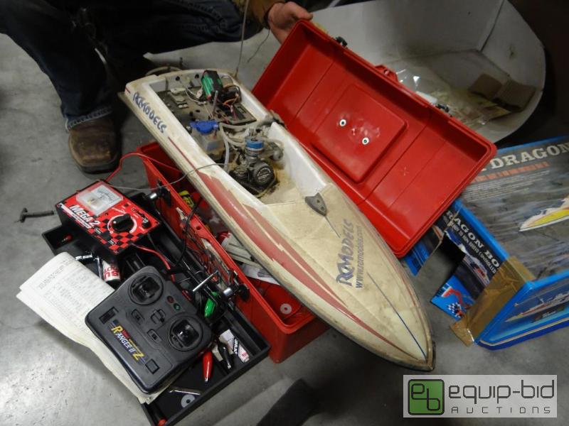 lot 825 image: Gas powered remote control boat with remote a...