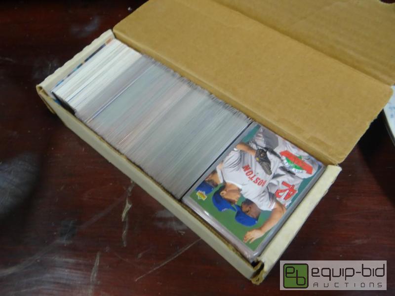 lot 909 image: 1 box of various sports cards and other cards...