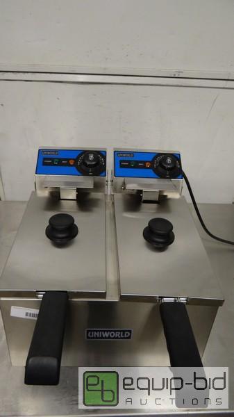 lot 199 image: New UniWorld 19LB Double Countertop Fryer