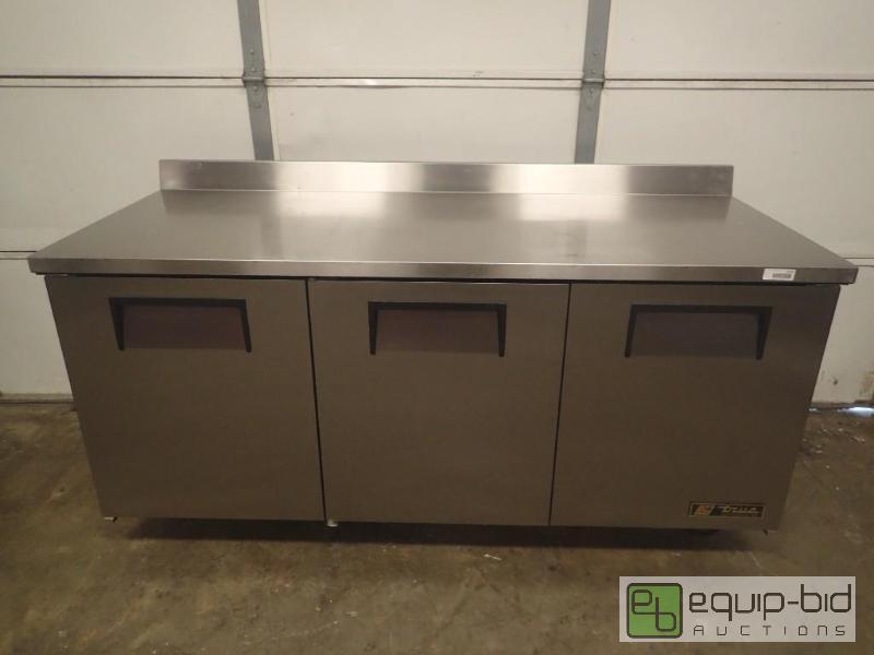 lot 279 image: NEW True 3 Door Stainless Refrigerated Worktop Prep Table On Casters