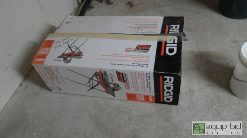 lot 595 image: Ridgid 8 Wet Tile And Paver Saw With Stand