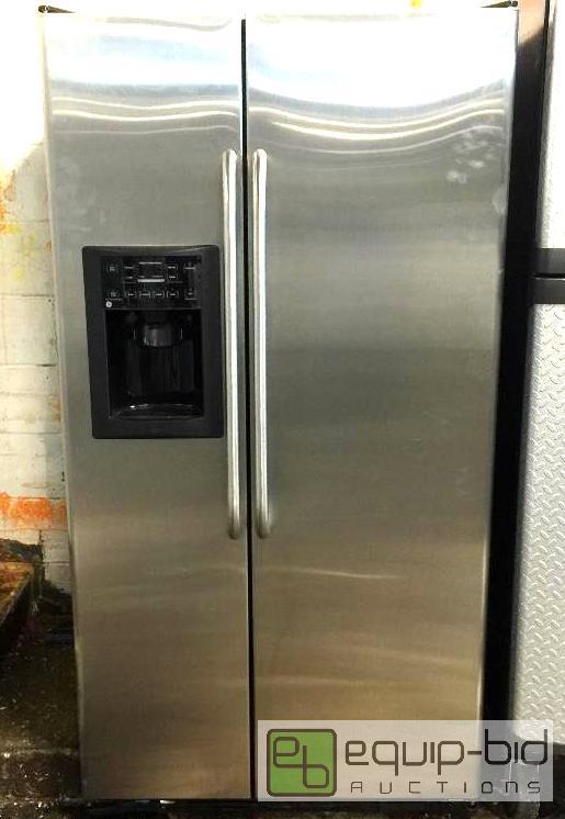 lot 67 image: GE Counter-Depth 22.7 Cu. Ft. Stainless Side-By-Side Refrigerator with Dispenser