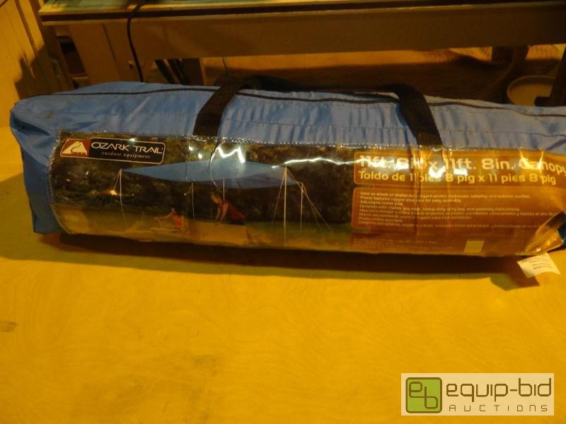 lot 4128 image: Ozark Trail 11x11 Portable Canopy Set