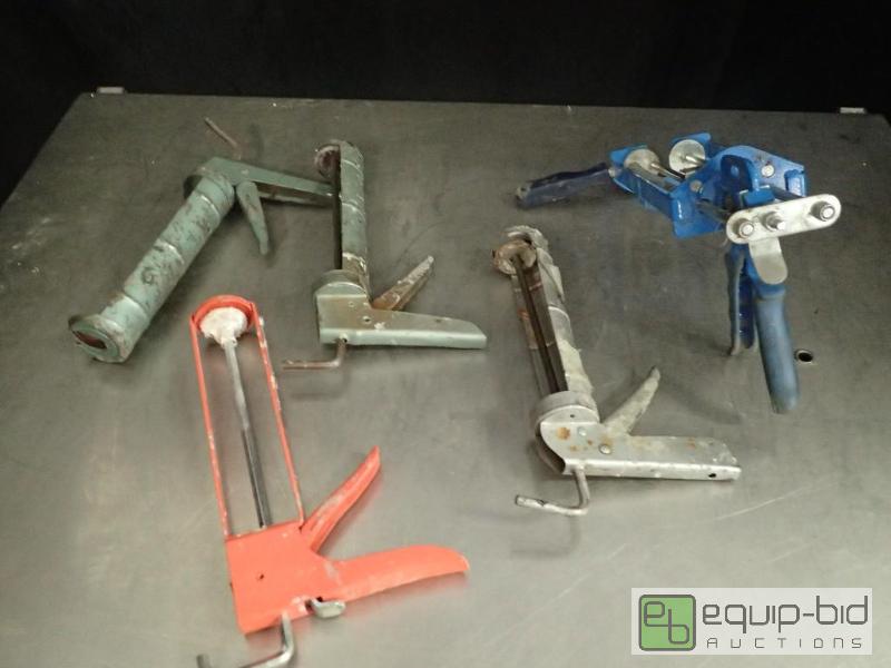 lot 325 image: (5) Calk Guns