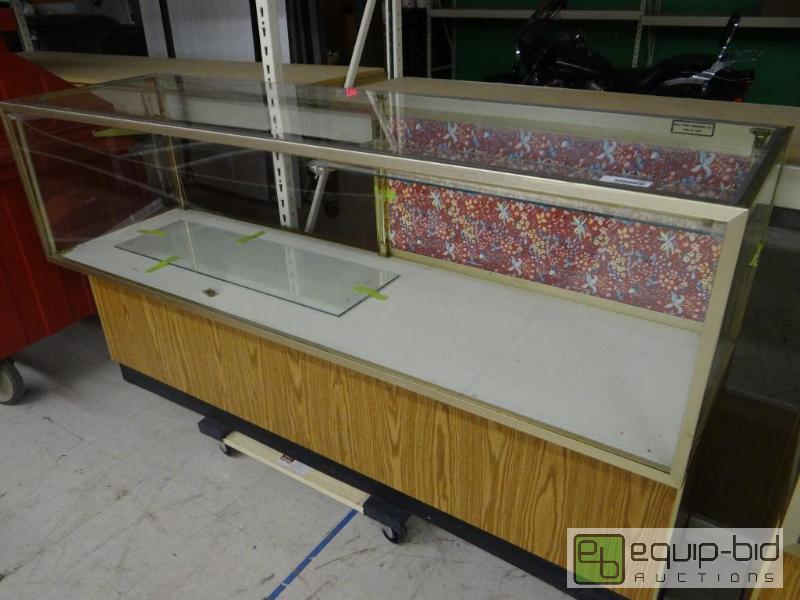 lot 2655 image: Lighted glass display case with 2 shelves.  7...
