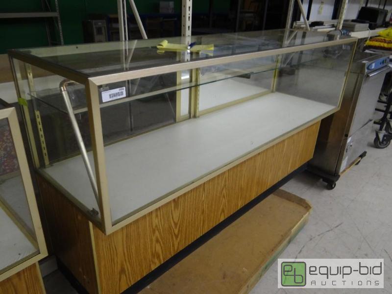 lot 2656 image: Lighted glass display case with 2 shelves.  7...