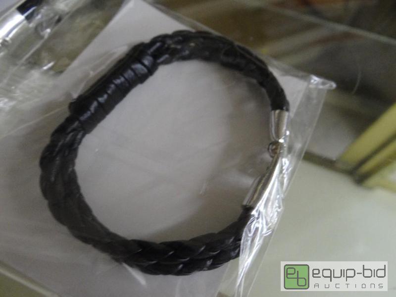 lot 2682 image: 2 new Kenneth Cole leather bracelets...