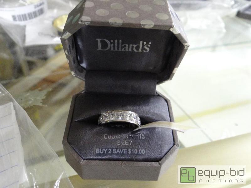 lot 2688 image: Michael Korhs ring in box. Missing 2 stones....