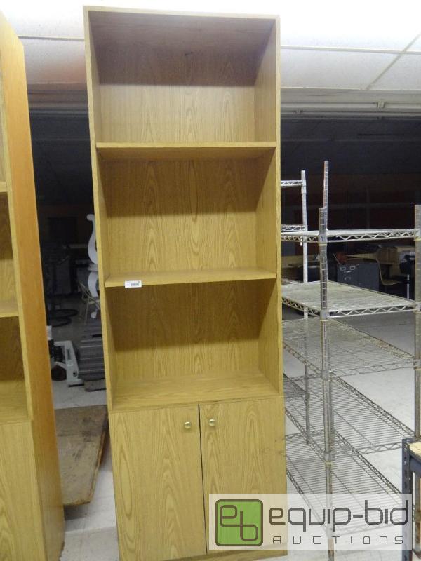 lot 501 image: Large bookshelf with shelves and 2 storage do...