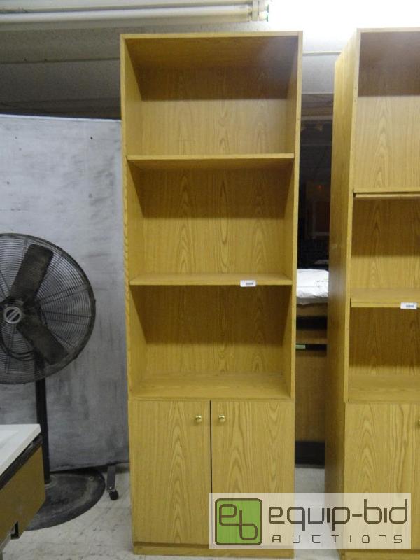 lot 504 image: Large bookshelf with shelves and 2 storage do...