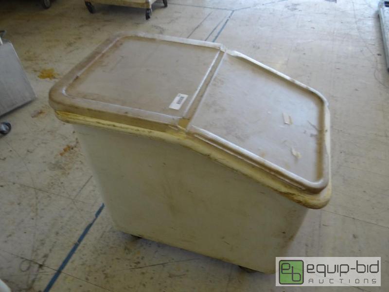 lot 556 image: Ingredient bin on wheels with lid....