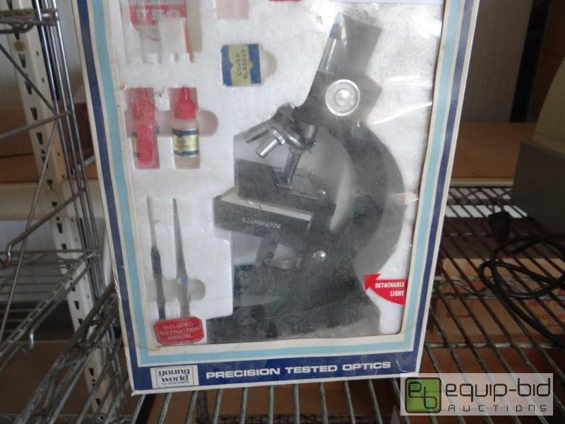 lot 572 image: New in box 750X&nbspmicroscope and supplies....