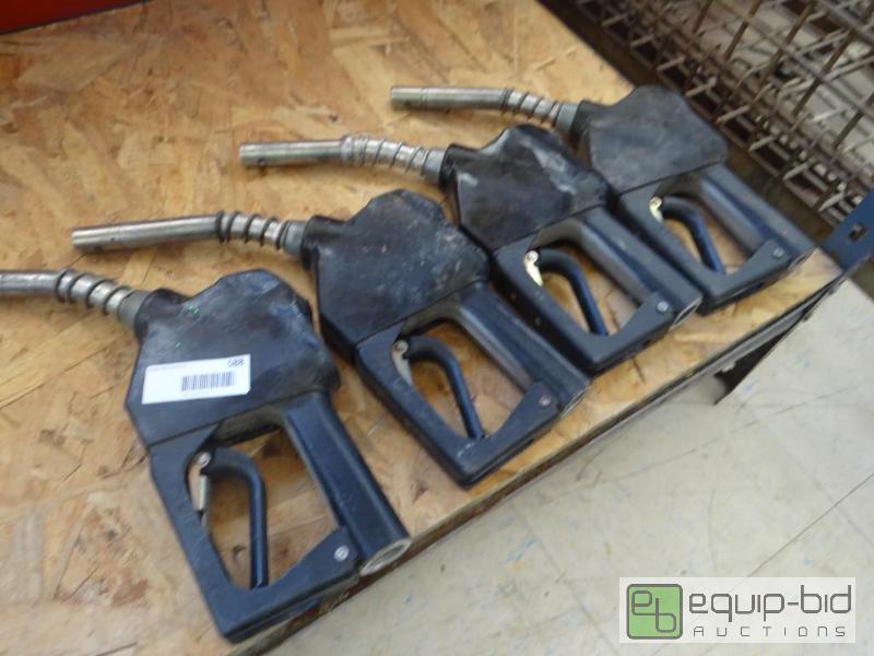 lot 588 image: Lot of 4 gas pump nozzles....