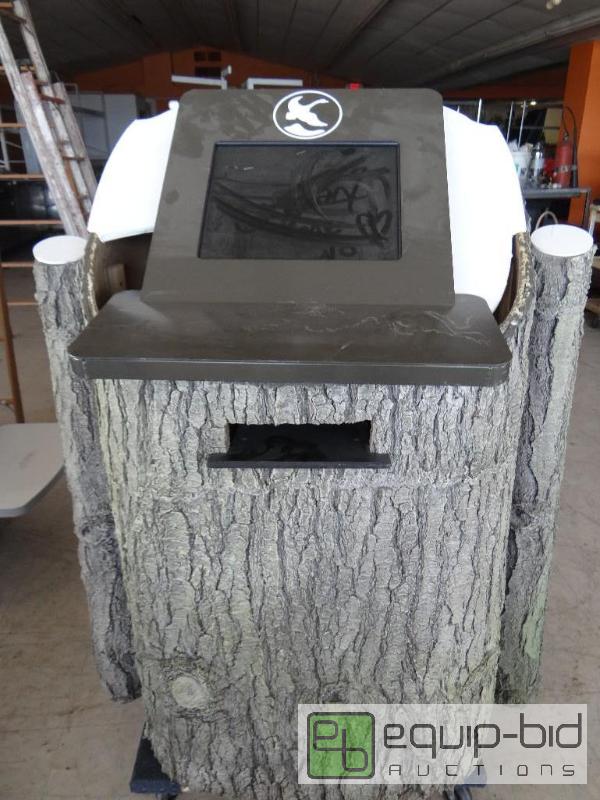 lot 610 image: Tree display stand with monitor.  Pretty cool...