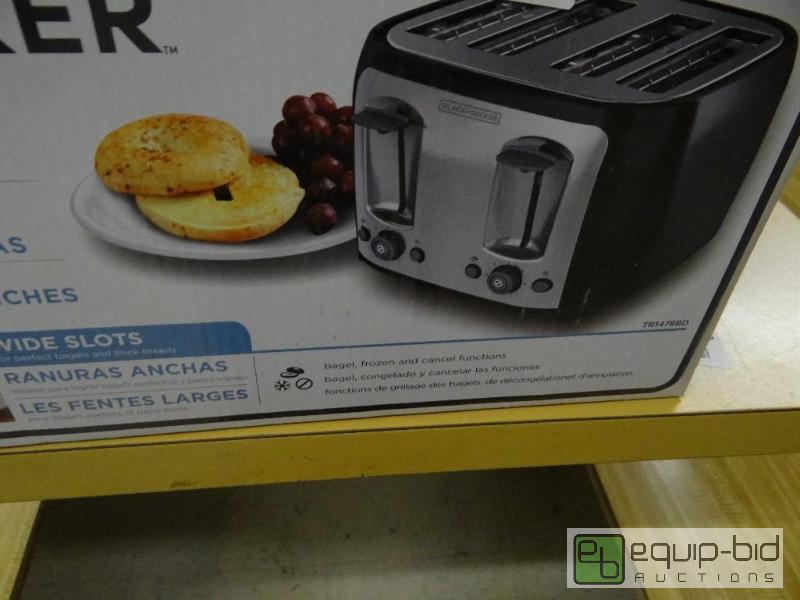 lot 769 image: New in box Black &amp Decker 4 slice toaster...