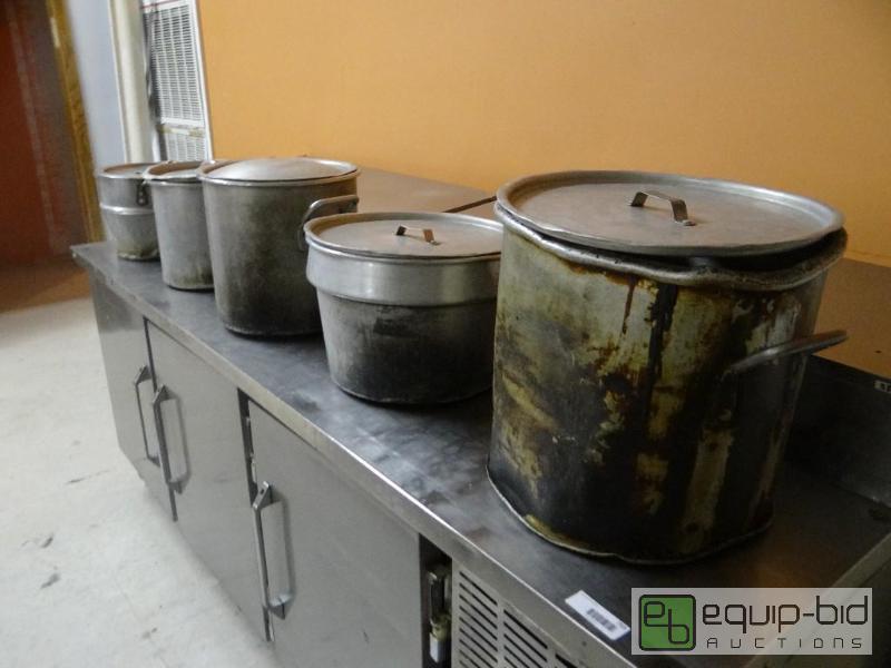 lot 773 image: Lot of 5 various sized stock pots and 5 lids....